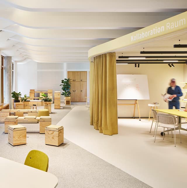 Eine Aufnahme von einem Office, gehalten in gelb.