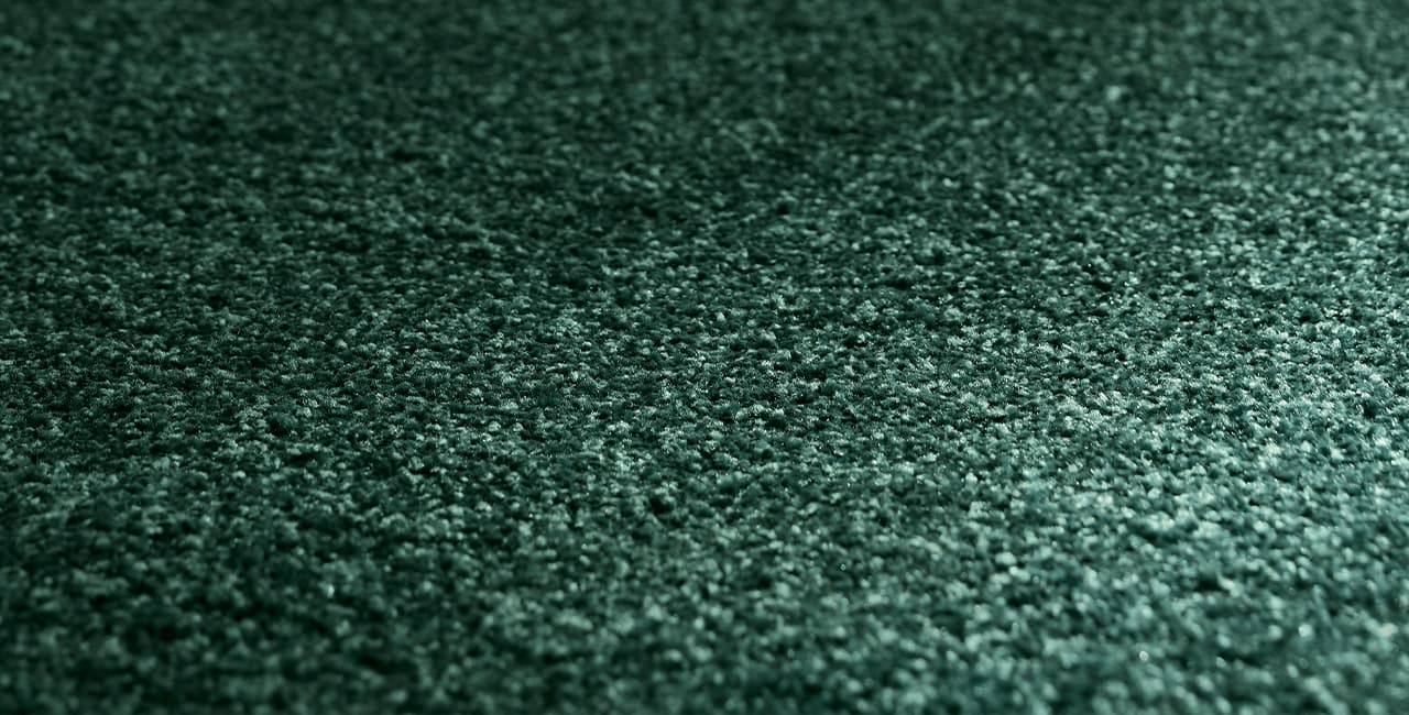 Grüner Teppich Detailbild