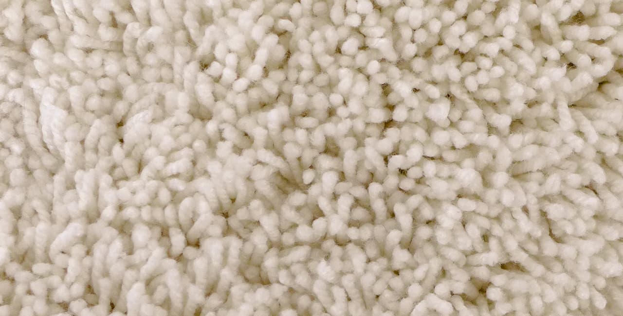Beigefarbiger Teppich Cocoon